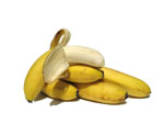 Valokuva banaanitertun banaaneista, jotka ovat valkoista taustaa vasten rykelmänä. Päällimmäinen banaani on puoliksi kuorittu. Banaanit ovat keltaisia kuoriensa osalta, mutta niissä on vähän tummempiakin kohtia.